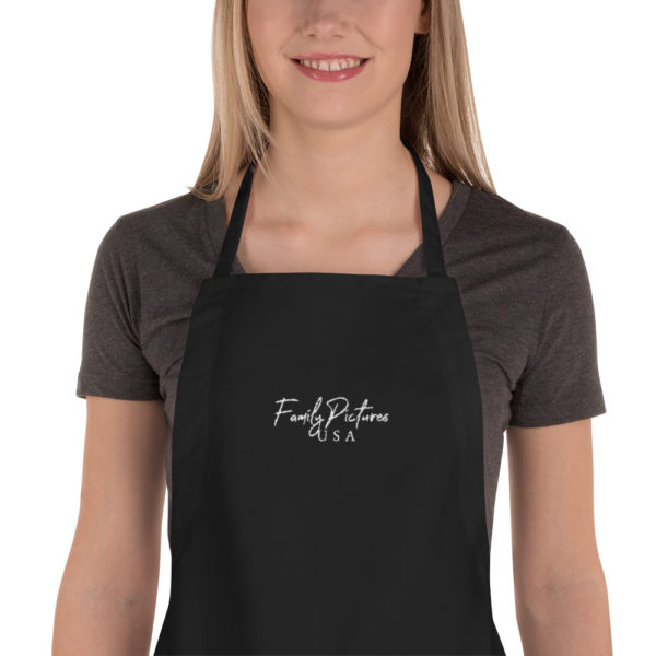 Family Pictures USA logo on a apron